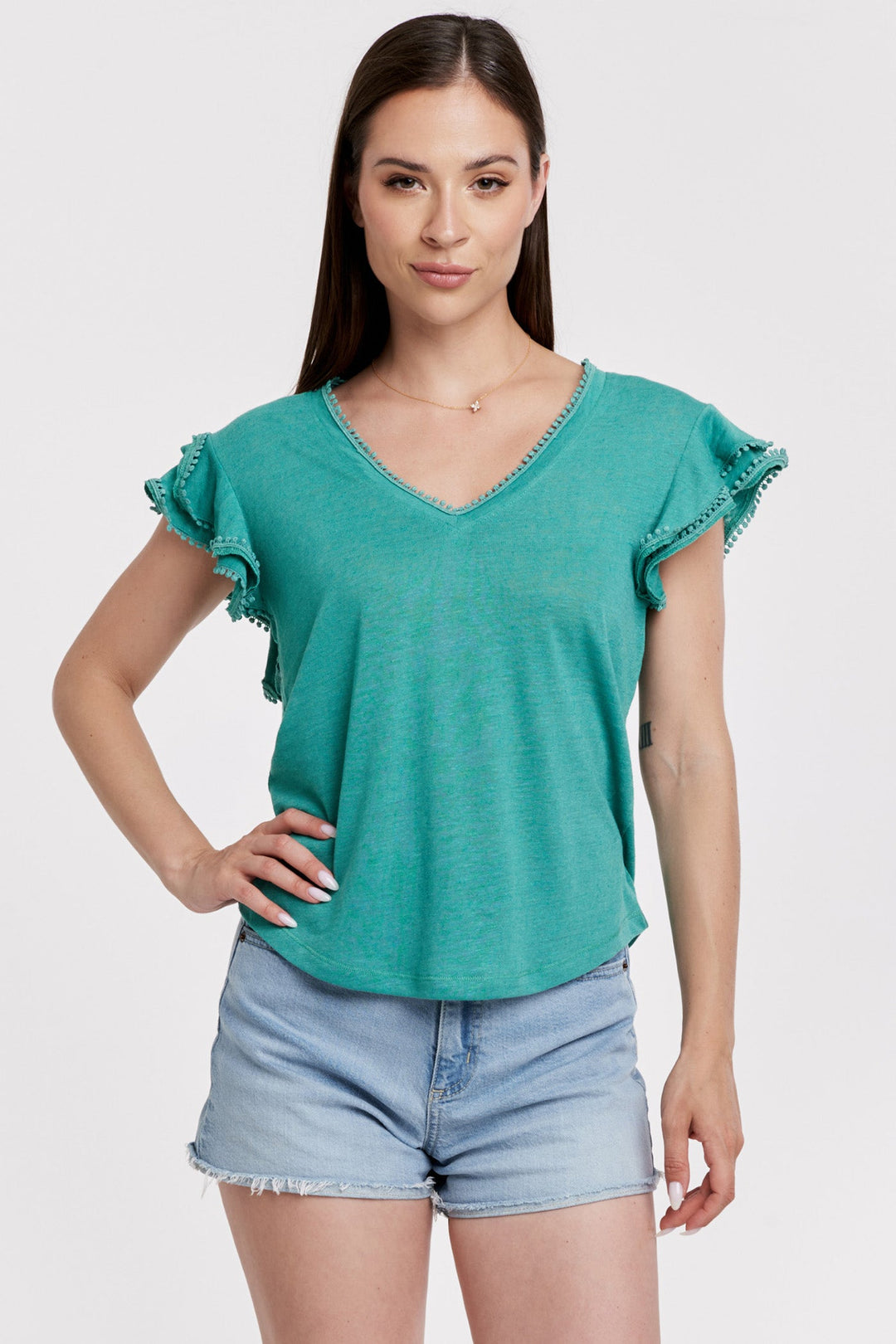 OSLO V-NECK FLUTTER SLEEVE TOP W/POM POM TRIM MEADOW TEAL
